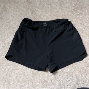 Athleta Girl run with it running shorts size L